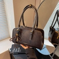 Retro coffee brown shoulder bag with long handles and feather pendant detail - Brown