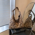 Large leopard print plush tote bag with unique knotted handle and fuzzy texture - Leopard Brown