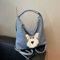 Mochila de mezclilla azul claro para mujer con parche de perrito de peluche blanco casual - Azul