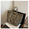 Large capacity tote bag featuring a classic leopard print and sturdy canvas handles - Leopard Khaki
