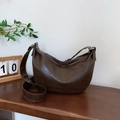 Chic dark brown crescent crossbody bag in vintage crinkled leather finish - Brown