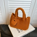 Handmade chunky knit tote bag in orange-brown color with a mini matching charm - Orange