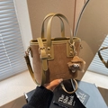 Brown suede tote bag with olive green leather trim and cute monster plush pendant - Khaki