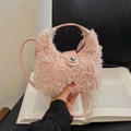 Pink faux fur crossbody bag with silver turn-lock and round top handle in soft plush style - Pink