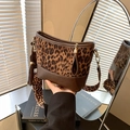 Stylish leopard print bucket bag with wide shoulder strap and tassel detail decoration - Brown