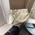 Chic pleated off-white bucket bag with a metal chain strap and circular top handle - Off White