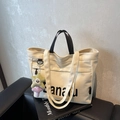 Borsa tote in tela bianco panna con stampa Eanau nera e ciondolo a stella in peluche - Bianco Crema Con Ciondolo