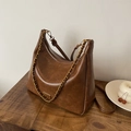 Minimalist brown vintage hobo bag with metal chain strap and spacious commuter design - Tan