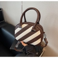 Detail of contrast stitch patchwork handbag with brown lychee texture and cream stripes - Brown