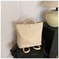 Elegante borsa tote beige in finta pelle con texture per spalla e trasporto a mano - Bianco