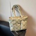 Light green quilted tote bag with floral embroidery and matching mini zipper pouch - Green