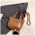 Retro brown leather bucket bag with vintage triangular emblem and adjustable strap - Brown No Pendant