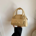 Bolso Boston amarillo crema en cuero craquelado con elegante detalle de lazo - Amarillo