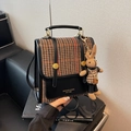 Vintage houndstooth contrast color backpack with a cute rabbit pendant and black trim - Black And Coffee With Pendant