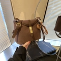 Brown frosted suede bucket bag with decorative chocolate donut charm and gold buckle - Coffee with Pendant