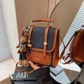 Retro denim backpack in dark blue with brown leather trim and cute rabbit charm - Brown with Pendant