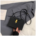 Structured black fabric crossbody bag with vintage gold turn-lock and leather trim - Black without Pendant