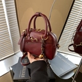 Vintage dark wine red leather bowling bag with gold hardware and top handles - Red with Pendant