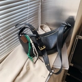 Vintage style black faux leather crossbody dumpling bag featuring a unique green rope charm - With Pendant / Black