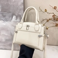 Creamy white lychee grain leather handbag with silver lock and detachable shoulder strap - White