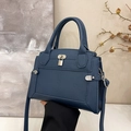 Dark blue pebbled leather handbag with silver lock and detachable long strap - Blue
