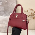 Chic burgundy lychee texture handbag with gold padlock detail and long strap - Burgundy