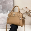 Elegant tan lychee leather handbag with silver padlock and adjustable shoulder strap - Khaki