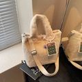 Chic cream faux fur plush bucket bag with adjustable strap and charm pendant - Cream White with Pendant