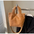 Faux fur plush bucket bag in deep camel brown with top handle and crossbody strap - Brown No Pendant