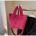 Fuchsia faux fur bucket bag with plush texture and adjustable crossbody strap - Fuchsia (No Charm)
