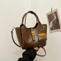 Retro brown PU leather bucket bag with top handles and mini charm accessory - With Pendant Style / Coffee