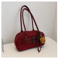 Detail of burgundy suede boston bag featuring decorative leather strap and silver buckle - Red with Pendant