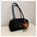Detail of black suede hobo bag featuring silver buckle and cute plush bear charm - Black with Pendant