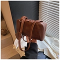 Detail of vintage brown shoulder bag with dual zipper and fine matte leather texture - Brown