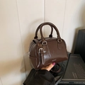 Deep brown vintage mini Boston bag in glossy PU leather with adjustable shoulder strap - Brown
