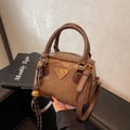 Retro brown Boston handbag in matte finish with gold triangular plaque and charm - With Charm / Khaki