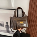 Retro deep brown polished leather bucket handbag with gold fashion accessories plate - Brown