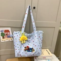 Light blue tote bag with colorful dots, plush dog patch, and yellow charm - With Pendant / Blue