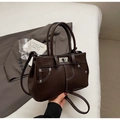 Dark brown leather vintage handbag with contrast white stitching and silver rotary lock - Coffee No Charm