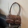 Vintage braune Leder-Bowlingtasche mit langen Griffen und silbernen Reißverschlüssen - Braun