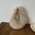 Light camel faux fur dumpling bag with plush texture and gray metal chain strap - Khaki