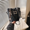 Black bucket shoulder bag with star charm and silver wavy buckle hardware - With Pendant / Black