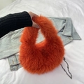 Fuzzy orange plush dumpling bag with chain strap and top handle for women - Orange