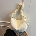 Chic beige nylon tote bag with pleated scrunchie strap and trendy quilted texture - White