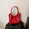 Glossy red shoulder bag with bow detail on a black leather jacket background - Style 2 (Patent Bow) / Red