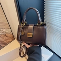 Chic dark brown faux leather rectangular handbag with gold buckle and stylish charm - With Charm / Brown