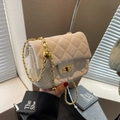 Quilted white shoulder bag with gold chain strap and metal clasp for women - Off-white