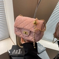 Pink quilted crossbody bag with golden ball chain and metallic twist lock closure - Pink