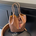 Vintage brown leather bucket tote bag with yellow lining and creative food charms - Brown with Pendant