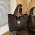 Grote shopper tas van zware zwarte denim met een kenmerkende geweven logo-patch - Zwart